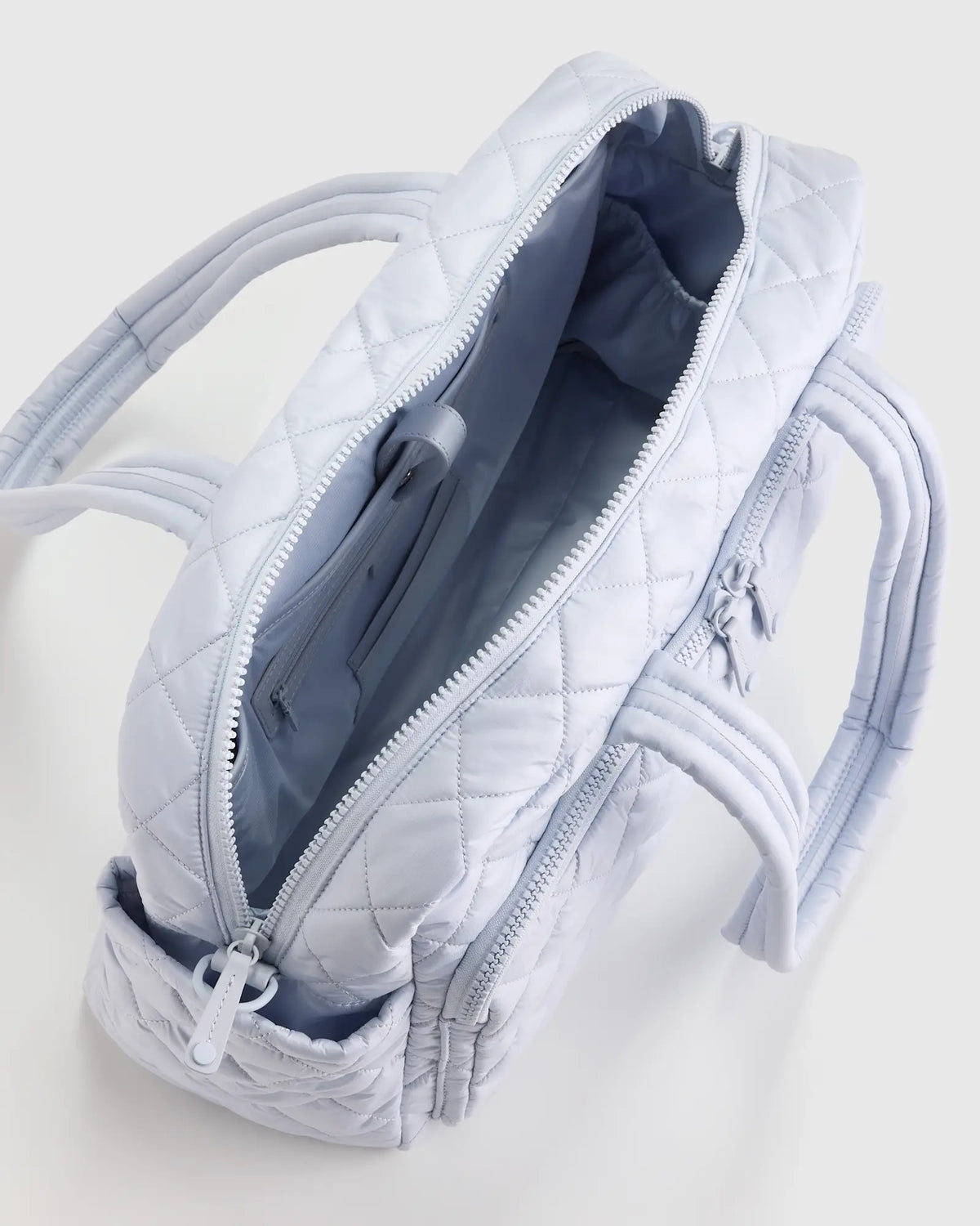 Transit Quilted Duffle Bag - US 8040